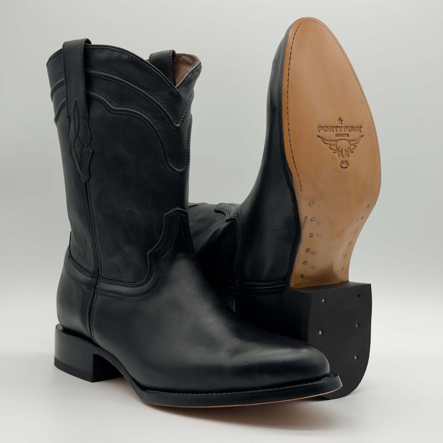 Bota Vaquera Negro Punta Oval — Suela de Cuero